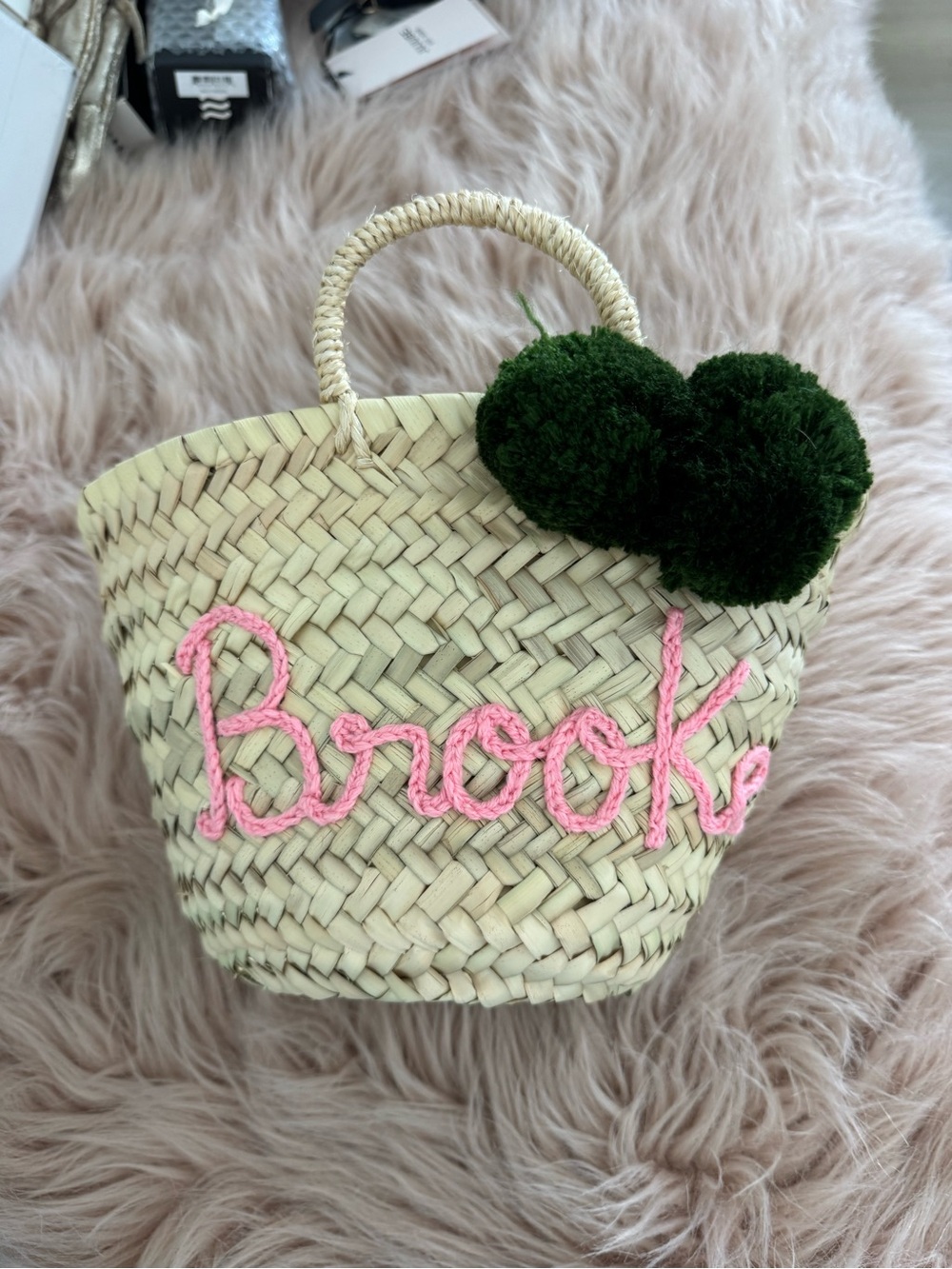 Personalized ‘Brooke’ Straw Tote with Pink Name Stitching and Green Pom-Poms